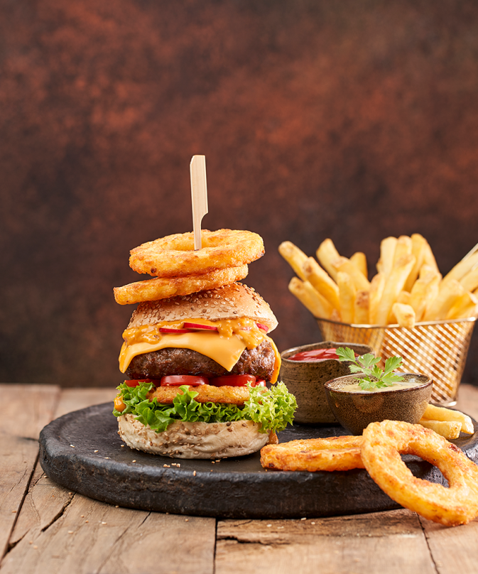 Any Burger + Any side (Onion Rings/ French Fries/Sweet Potato Fries) + Cane Of Soda